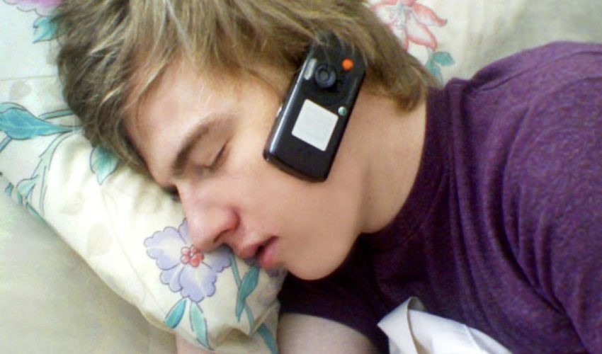 sleeping with phone next to head
